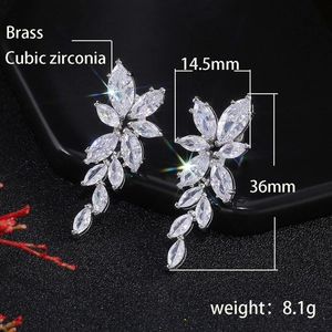 Detailed view of teardrop cubic zirconia earrings with size measurements in mm