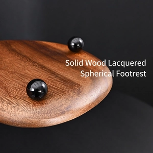 Minimalist walnut wood entryway key tray with smooth black piano lacquer finish feet