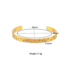 Gold stainless steel star engraved open bangle with cubic zirconia details and dimensions