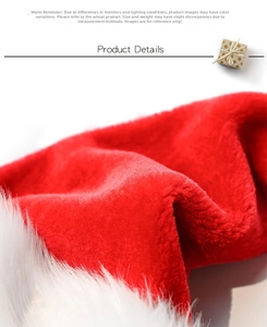 Close-up of high-density red plush fabric and white faux fur trim on a Christmas hat