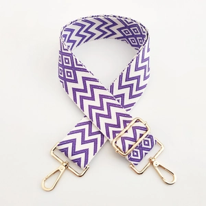 Detail of adjustable 5cm purple and white zigzag woven strap with gold metal swivel hooks