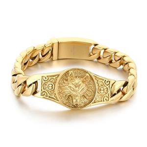 Punk style gold stainless steel cuban chain bracelet featuring a detailed wolf head emblem