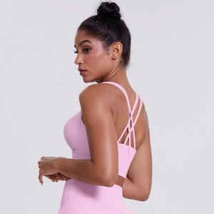 Reggiseno sportivo rosa con spalline incrociate sul retro per yoga e fitness