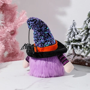 Macro shot of Halloween gnome with purple sequined wizard hat and black spider detail