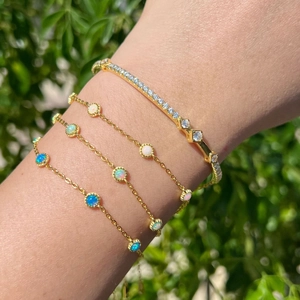 Elegant S925 silver Mobius bracelets with gold plating, opals, and zircon stones