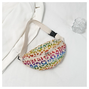 Detail of colorful leopard straw waist bag with adjustable strap and twin zippers