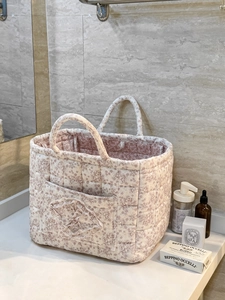 Quilted floral corduroy storage basket with pastoral peony pattern and ruffled front pocket