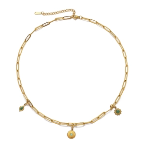 Gold stainless steel link necklace with three vintage green gemstone charms on white backdrop