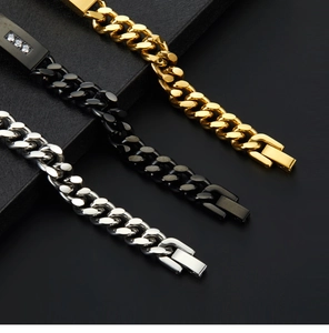 Detail view of Cuban chain bracelets in gold, silver, and black with CZ diamond accents