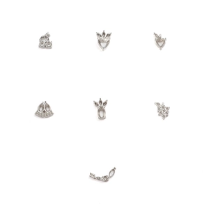 Detailed close-up of stainless steel strawberry and cherry pendant settings for DIY jewelry