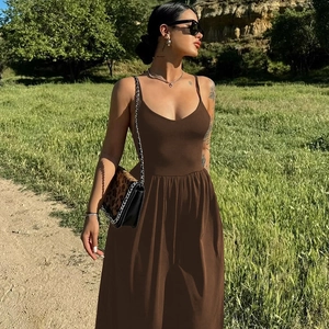 Detail of a sexy backless brown jumpsuit for women featuring a stylish flowing maxi silhouette