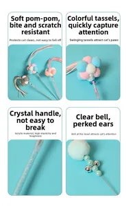 Detail showing plush pom-poms with crystal acrylic stick and bell for cat toy stick