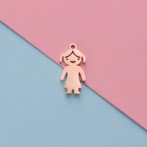 Polished rose gold stainless steel pendant in a girl shape on pink and blue background
