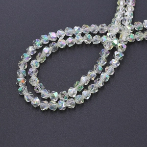 Macro shot of 6mm faceted colorful crystal glass beads with iridescent finish