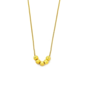 Minimalistische Goldkette mit fünf strukturierten Perlen an einer feinen Box-Kette