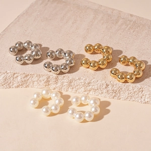 Minimalist C-shaped ear cuffs set in gold, silver, and faux pearl bead designs