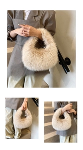 Detail of soft beige fluffy faux fur handbag with elegant crescent shape for winter