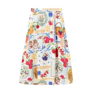 Close-up of vibrant Mediterranean fruit and basket print on off-white midi skirt fabric