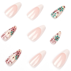 Faux ongles amande style French avec bordure blanche et motifs floraux rouges et verts