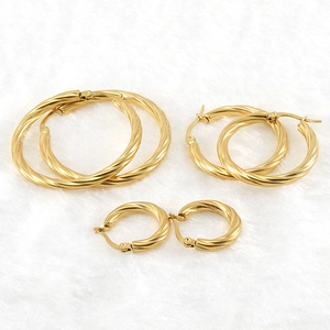 Three pairs of 18K gold-plated stainless steel twisted hoop earrings in varied sizes