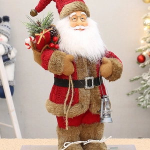Detail of 12-inch Santa doll with red sweater, silver lantern, and gift sack decor