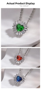 Detailed view of heart-shaped zircon pendants in emerald, ruby, and sapphire colors