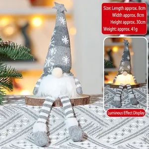 Detail showing 30cm gray Christmas glow gnome with LED base and knitted hat texture