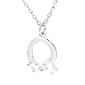 Detailed close-up of a silver necklace pendant with sparkling cubic zirconia on white background