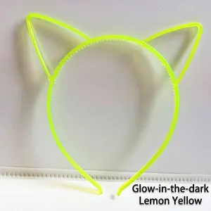 Close-up of luminous lemon yellow cat ear headband with non-slip inner teeth detail
