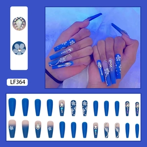 Detailed set of 24 blue long square press-on nails with white flowers and rhinestones