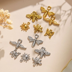 304 stainless steel animal pendants with bee, sun, and butterfly designs in gold and silver