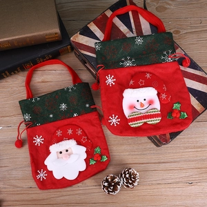 Christmas gift bags with Santa and Snowman 3D characters on festive felt fabric