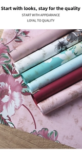 Detail view of multi-style vintage floral waterproof bouquet wrapping paper rolls