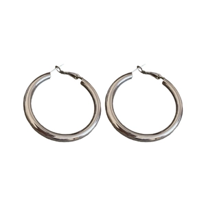Minimalist silver hoop earrings with large polished hollow round design and snap closure
