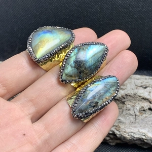 Gold plated wide band adjustable rings featuring irregular blue labradorite stones
