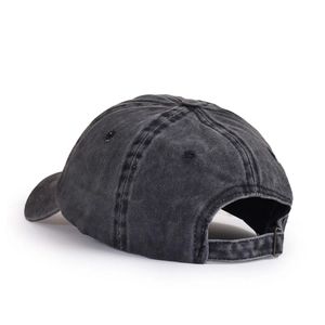 Detail of washed charcoal grey cotton baseball cap showing adjustable bronze buckle and stitching