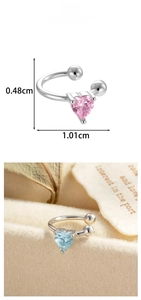 Macro detail of heart-shaped zircon ear cuff measuring 1.01cm wide by 0.48cm high