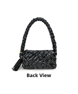 Back view of black oil wax leather woven crossbody bag with long side tassels and metallic rings