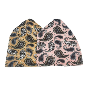 Ginger and pink paisley plush beanie hats for men and women with minimalist casual design