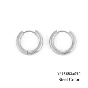 Detailed view of silver steel hoop earrings with polished finish and snap closure