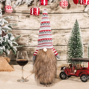 Christmas gnome bottle topper with grey knitted hat and thick brown faux fur beard