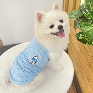 Breathable blue knitted pet vest with H2O embroidery on a white Pomeranian dog