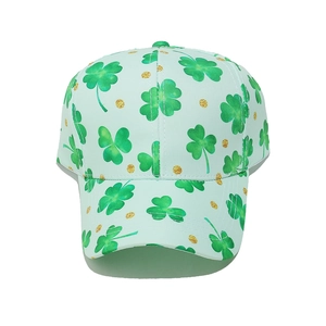 Detail of green St. Patrick's Day baseball cap with shamrock prints and gold glitter dots