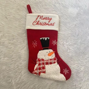Red Christmas stocking with snowman design and Merry Christmas embroidery on fur trim
