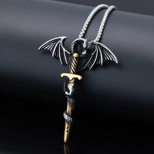 Detailed view of dual-tone silver and gold dragon sword pendant on a steel chain