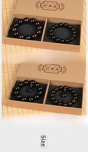 Detailed comparison of ebony wood bead bracelets with natural grain in premium gift boxes