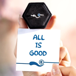 Detail of S925 sterling silver evil eye ring in a black velvet hexagonal box
