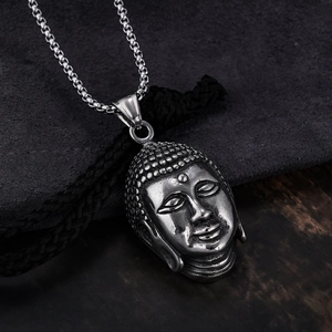 Ethnic style stainless steel Buddha head pendant necklace with a vintage silver finish