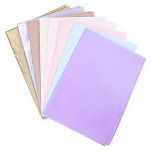Multi-color tissue paper sheets in purple, pink, and gold for flower bouquet wrapping