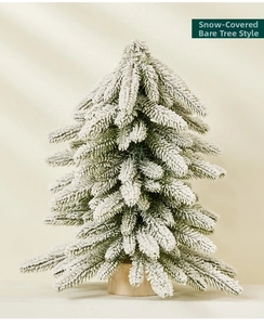 Close-up of artificial flocked Christmas tree with realistic snow on a wooden base